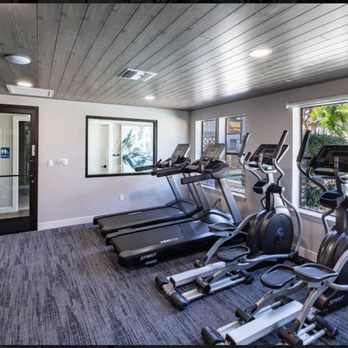 AG Contracting Group - Upgraded resident fitness center featuring new flooring, custom ceiling, and modern equipment. - General Contractors Near Me - Las Vegas, Nevada AG Contracting Group - Upgraded resident fitness center featuring new flooring, custom ceiling, and modern equipment. - General Contractors Near Me - Las Vegas, Nevada