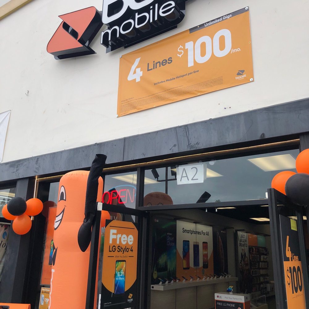 Boost Mobile Premier Store - This is the outside of the store they have a cool wavy dude - Mobile Phones Near Me - Santa Ana, California