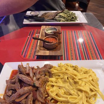 Mimi's Peruvian Cuisine - top: Tallarines Verdes con Bisteck bottom: Tallarines Huancainos con Lomo al Jugo - Peruvian Near Me - Honolulu, Hawaii Mimi's Peruvian Cuisine - top: Tallarines Verdes con Bisteck bottom: Tallarines Huancainos con Lomo al Jugo - Peruvian Near Me - Honolulu, Hawaii