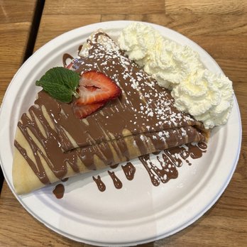 Fraise Cafe - I had the Strawberry and Banana Crepe with milk chocolate drizzle Delicious! And my coffee came with a cute little cookie!! - Creperies Near Me - Fullerton, California Fraise Cafe - I had the Strawberry and Banana Crepe with milk chocolate drizzle Delicious! And my coffee came with a cute little cookie!! - Creperies Near Me - Fullerton, California