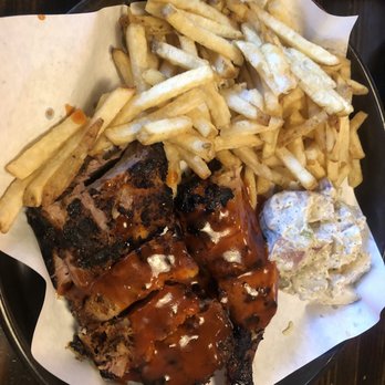 Phil's BBQ - ribs and chicken with fries and potato salad - Barbeque Near Me - San Diego, California