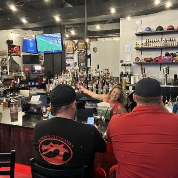 Halligans - Stacy and my bros at the bar - Pubs Near Me - Lexington, Kentucky