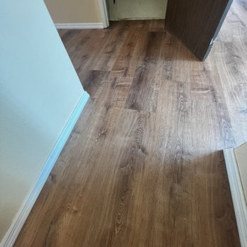 Dynamic Flooring - Luxury Vinyl Flooring Install - Hallway Leading to Closet Door - General Contractors Near Me