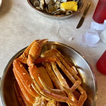 Shaking Crab - Snow crab with garlic butter, Cajun spices along with corn on cob & potato. Clams with garlic butter. - Seafood Near Me - Bonita Springs, Florida Shaking Crab - Snow crab with garlic butter, Cajun spices along with corn on cob & potato. Clams with garlic butter. - Seafood Near Me - Bonita Springs, Florida