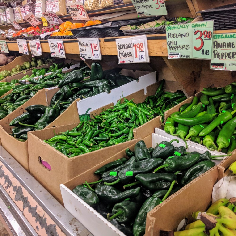 Monterey Market - chilies lined up along the scoville scale - Fruits & Veggies Near Me - Berkeley, California