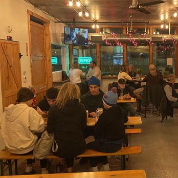 BKS Artisan Ales - people sitting at tables in a restaurant - Breweries Near Me - Kansas City, Missouri