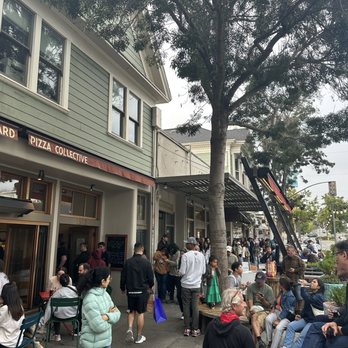 Cheese Board Pizza - Standard operating procedure. Always a line, but also oddly, always seating/ standing table room. - Pizza Near Me - Berkeley, California