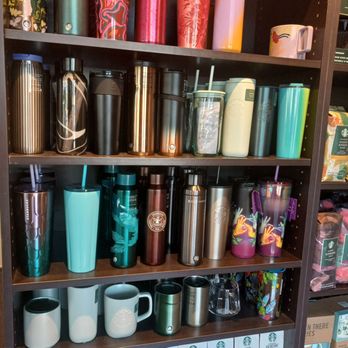 Starbucks - a shelf full of coffee cups and mugs - Coffee & Tea Near Me - Winter Springs, Florida Starbucks - a shelf full of coffee cups and mugs - Coffee & Tea Near Me - Winter Springs, Florida