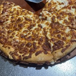 Pizza Hut - This is a cheese pizza. We had same thing last time so this is going to be our last time here. This is disgusting and sad.
