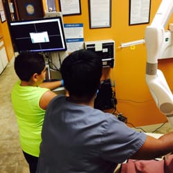 Salman Dental & Orthodontics - Taking X-rays with kids