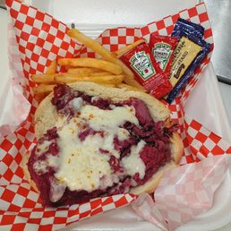 Pastrami sandwich with fries