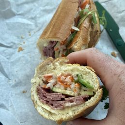 BM4 -Grilled Pork Sausage Banh Mi - Overall really solid! Great bread, load fresh veggies and good meat too. BM4 -Grilled Pork Sausage Banh Mi - Overall really solid! Great bread, load fresh veggies and good meat too.