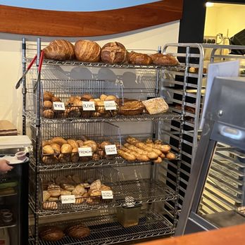 Uprise Bakery - a baker working in a bakery - Bakeries Near Me - Columbia, Missouri Uprise Bakery - a baker working in a bakery - Bakeries Near Me - Columbia, Missouri
