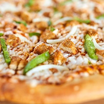 Toppers Pizza - a pizza topped with cheese and green peppers - Pizza Near Me - Omaha, Nebraska Toppers Pizza - a pizza topped with cheese and green peppers - Pizza Near Me - Omaha, Nebraska