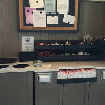 Chick-fil-A - Two condiment stations.  Glad to see they'll finally take unused sauces back.  No point in throwing them away! - Fast Food Near Me - Denver, Colorado