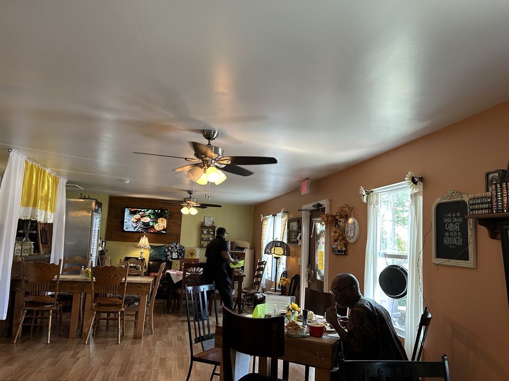 Sunday's Cafe 64 Logo