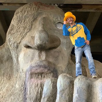 Fremont Troll - Cheesehead Nation up on the troll - Public Art Near Me - Seattle, Washington Fremont Troll - Cheesehead Nation up on the troll - Public Art Near Me - Seattle, Washington