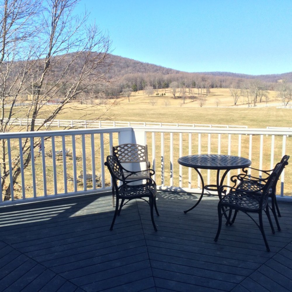Castle Hill Cider - Upstairs balcony. - Cideries Near Me - Keswick, Virginia Castle Hill Cider - Upstairs balcony. - Cideries Near Me - Keswick, Virginia