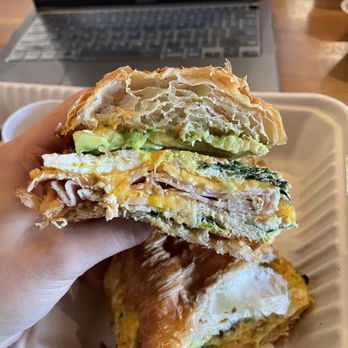 Coffee Nature - Breakfast Sandwich ($11 + $2.50 avocado) cross section - Coffee & Tea Near Me - Costa Mesa, California