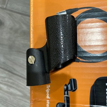 Guitar Center - The thing that holds your microphone has a different design, it means that they changed it. Plus the microphone doesn't even fit on it. - Musical Instruments & Teachers Near Me - Hollywood, California