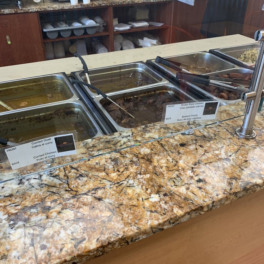 Golden Krust - a buffet with a variety of food items - Caribbean Near Me - Fairburn, Georgia Golden Krust - a buffet with a variety of food items - Caribbean Near Me - Fairburn, Georgia