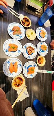 Kura Revolving Sushi Bar by null