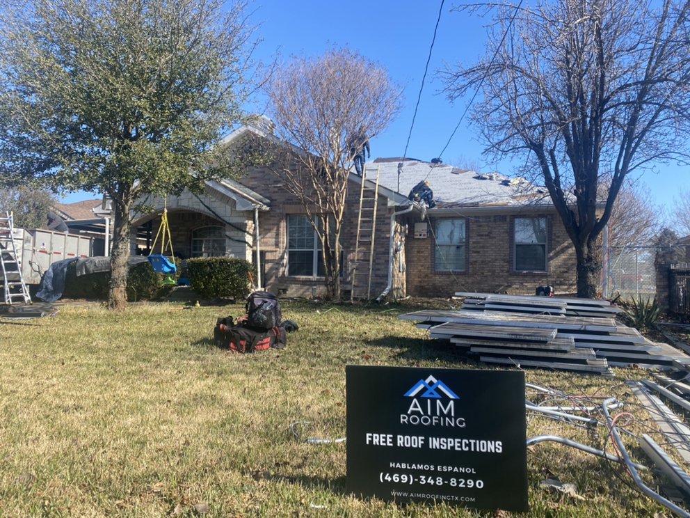 Slide of AIM Roofing