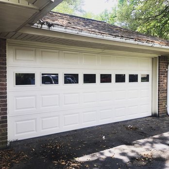 Lopez Garage Door - 16x7 Double car garage door with clear windows. - Garage Door Services Near Me Lopez Garage Door - 16x7 Double car garage door with clear windows. - Garage Door Services Near Me