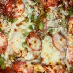Red's special with peppers, mushrooms, and tomatoes