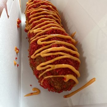 Two Hands Corn Dogs Town East Mall - a hot dog covered in ketchup and mustard - Korean Near Me - Mesquite, Texas Two Hands Corn Dogs Town East Mall - a hot dog covered in ketchup and mustard - Korean Near Me - Mesquite, Texas