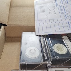 Vip Pro Lab & Video, Inc. - The box I rcd when picking up my videos...containing an invoice, a doc with service requested