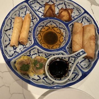 Charm Kitchen & Bar - Appetizer sampler- cheese rolls, crab wontons, spring rolls, dumplings - Thai Near Me - The Woodlands, Texas Charm Kitchen & Bar - Appetizer sampler- cheese rolls, crab wontons, spring rolls, dumplings - Thai Near Me - The Woodlands, Texas