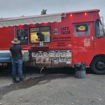Laz's Tacos - a man standing in front of a food truck - Food Trucks Near Me - Issaquah, Washington Laz's Tacos - a man standing in front of a food truck - Food Trucks Near Me - Issaquah, Washington