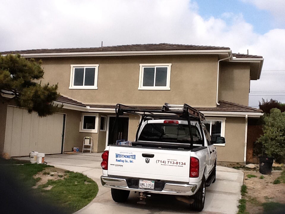 Slide of Westminster Roofing