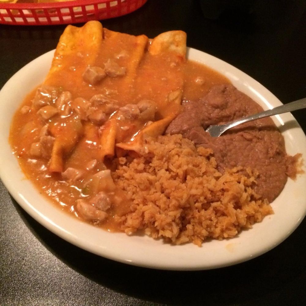 Cheese enchiladas smothered in pork chili!