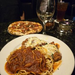 Chicken parmigana and a glass of Pinot Grigio