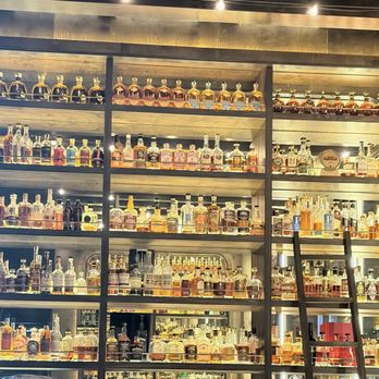 Warren - Naples - Wall of whiskey - Whiskey Bars Near Me - Naples, Florida