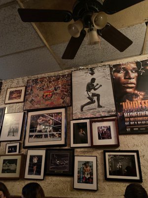 Photo of Jimmy's Corner - New York, NY, US. a wall full of framed photos