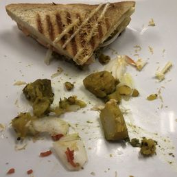 This is grilled (masala) sandwich which was cold on inside with huge chunks of cold potatoes