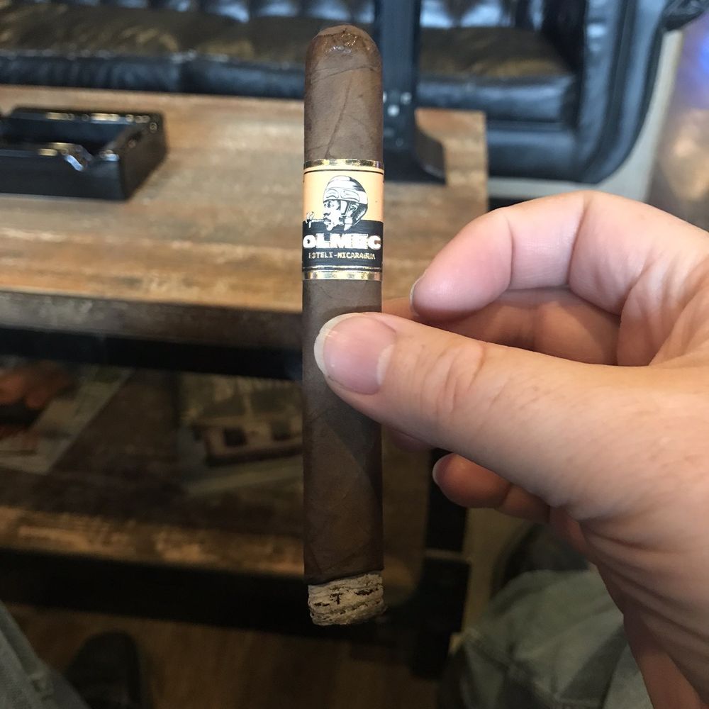 High End Cigars - a hand holding a cigar - Cigar Bars Near Me - Scotch Plains, New Jersey High End Cigars - a hand holding a cigar - Cigar Bars Near Me - Scotch Plains, New Jersey