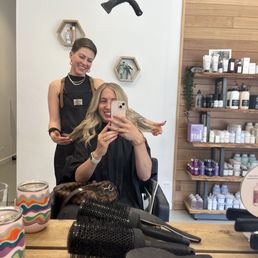 My girl, Dani, making my hair look awesome with blonde highlights.
