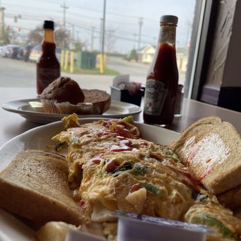 Sam's Diner - an omelet and toast on a plate - Diners Near Me - Rochester, New York Sam's Diner - an omelet and toast on a plate - Diners Near Me - Rochester, New York