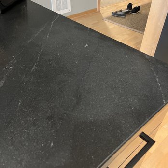 Stone Source - permanent stain from whatever sealant they used to "clean up" the spilled silicone. - Building Supplies Near Me - Plymouth, Minnesota Stone Source - permanent stain from whatever sealant they used to "clean up" the spilled silicone. - Building Supplies Near Me - Plymouth, Minnesota