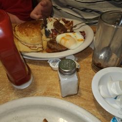 Fat Jacks Deli & Pub - Poached eggs with pancakes sausage