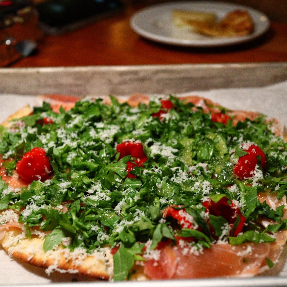 Bar Moxy - a pizza on a baking sheet - Cocktail Bars Near Me - Boston, Massachusetts