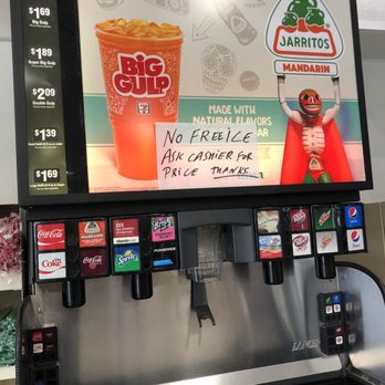 7-Eleven - a frozen drink machine with a menu on it - Gas Stations Near Me - Hayward, California