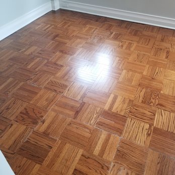 Footprints Floors - Chicago - bedroom floor. There are some wood filler that was not done by Footprints Floors, but their work did a nice job of giving an even patina. - Flooring Near Me - Chicago, Illinois