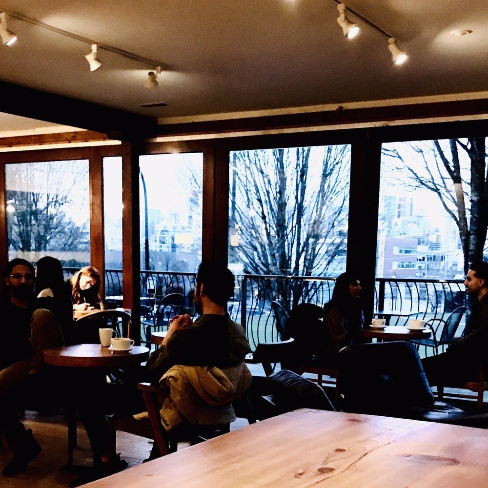 Milano Coffee - a group of people sitting around a table - Coffee & Tea Near Me - Vancouver, British Columbia Milano Coffee - a group of people sitting around a table - Coffee & Tea Near Me - Vancouver, British Columbia