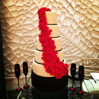 Sweet Escape Cakes - a wedding cake with red roses - Bakeries Near Me Sweet Escape Cakes - a wedding cake with red roses - Bakeries Near Me