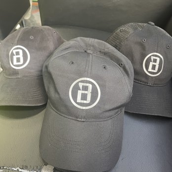 XSports - Reflective logo hats in athletic, dad hat, and trucker styles - Screen Printing/T-Shirt Printing Near Me - Dallas, Texas